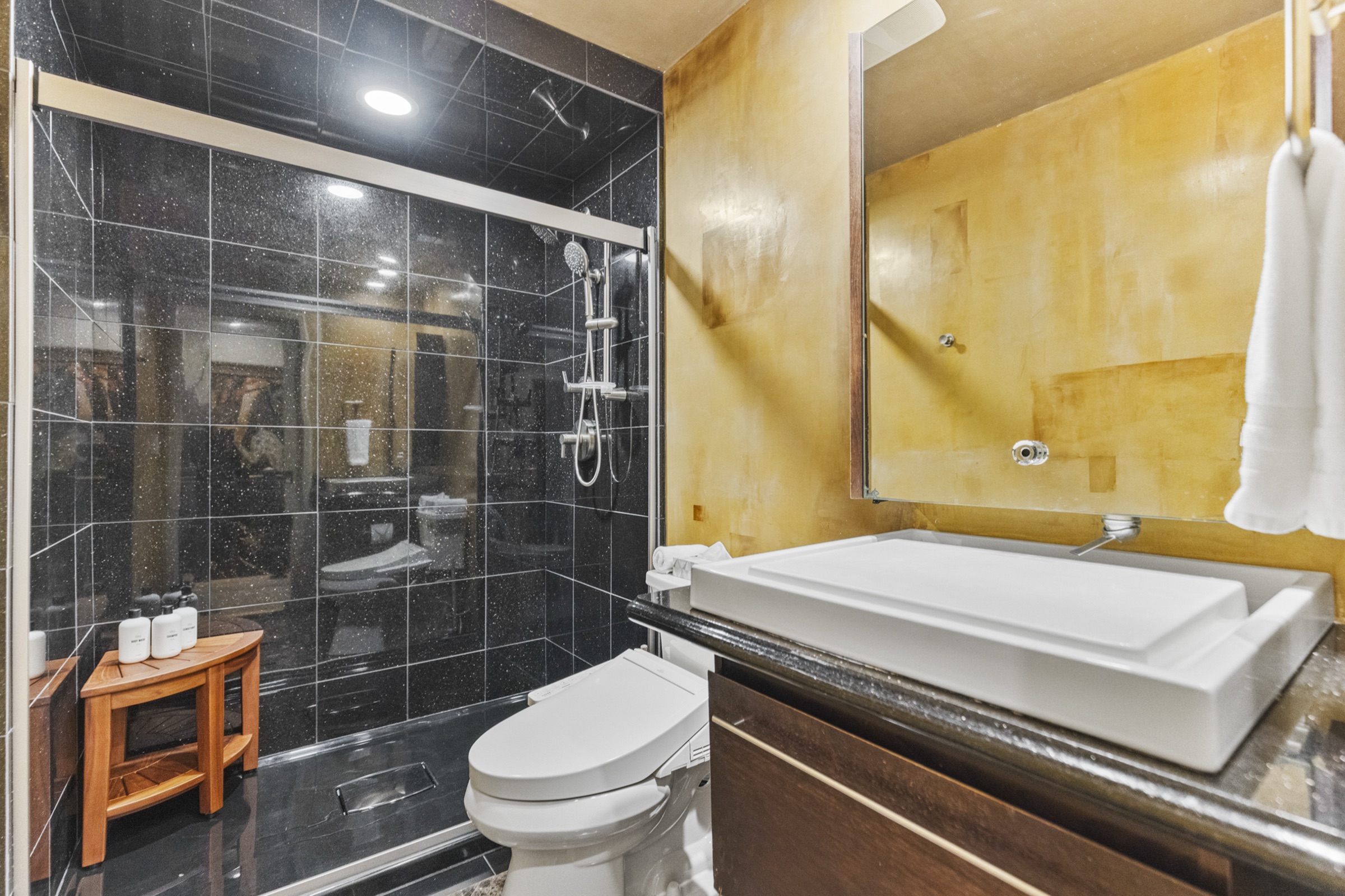 A steam shower and heated floors